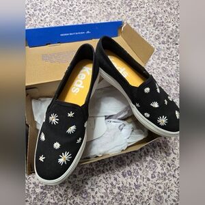 Keds Black and White Daisy Slip-On Sneakers